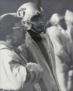 Pitts stands next to Stabler on the sideline during a Raiders’ game. Stabler, 69, lost his battle with colon cancer last week.