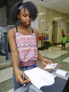 Christina Martin, 14, votes in a mock election Wednesday at the Dallas County Court House.